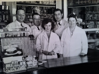 my Great Pepere St. Pierre (2nd on the left) in his grocery store